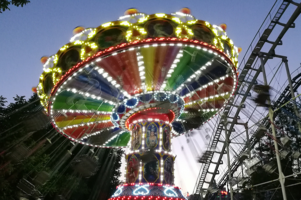 large wave swinger at night